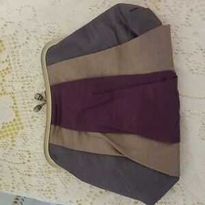 Small satiny clutch by Bath and Body Works